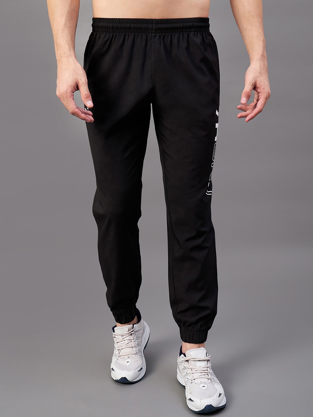 

Masch Sports Men Mid-Rise Typography Printed Rapid-Dry Sports Joggers, Black