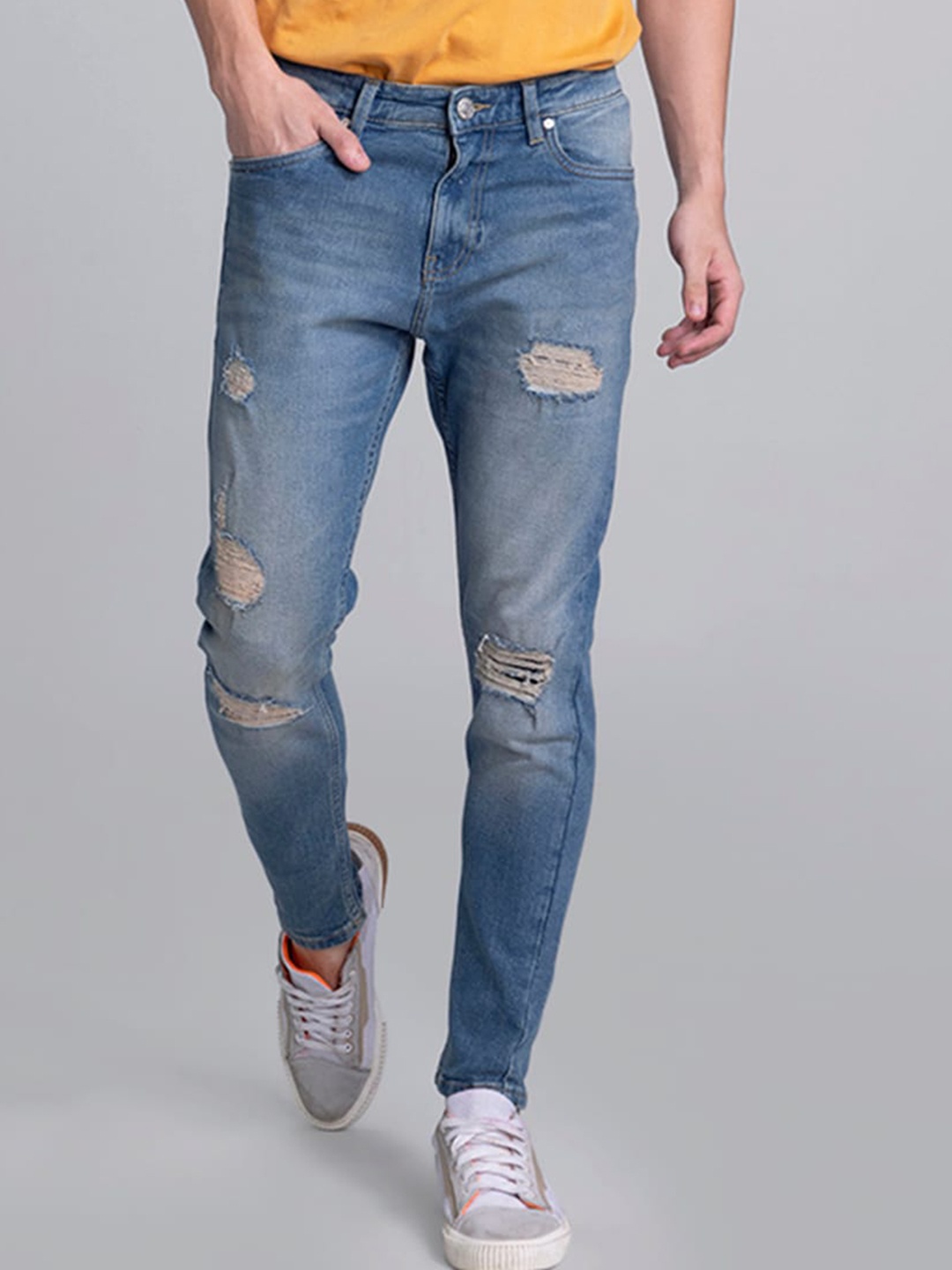 

Snitch Men Blue Highly Distressed Light Fade Stretchable Skinny Fit Jeans