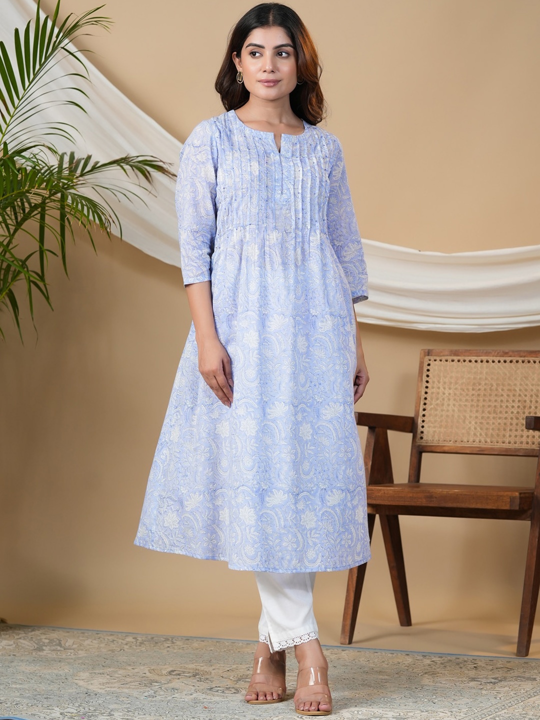 

Adveta Women Blue Ethnic Motifs Printed Flared Sleeves Thread Work Kurta