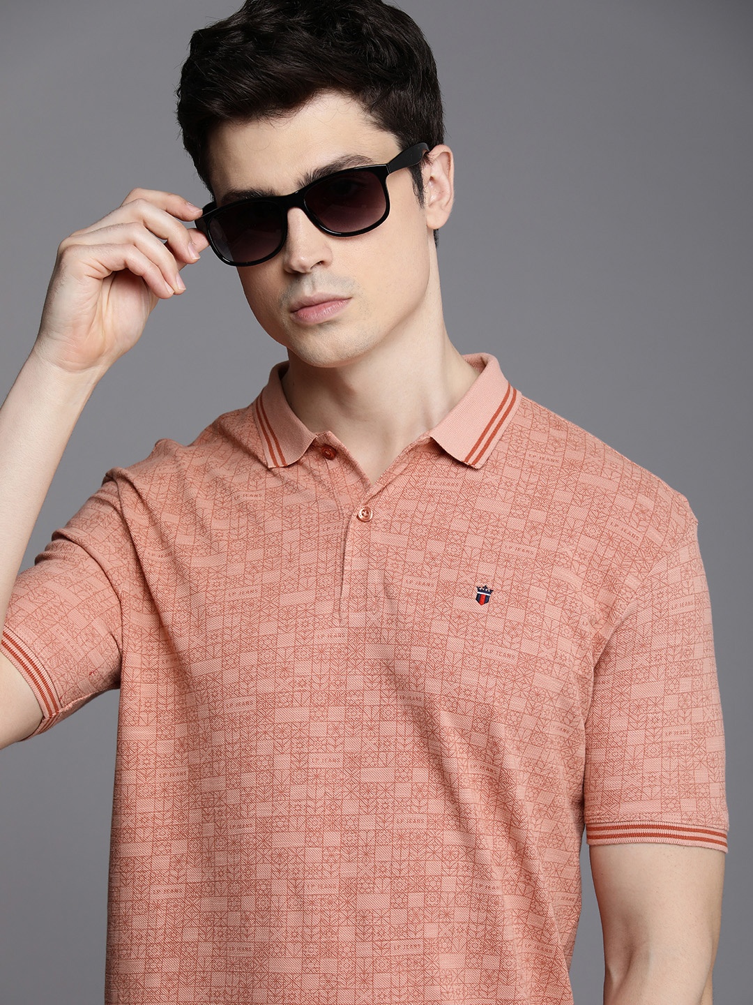 

Louis Philippe Jeans Printed Polo Collar Pure Cotton Slim Fit T-shirt, Peach