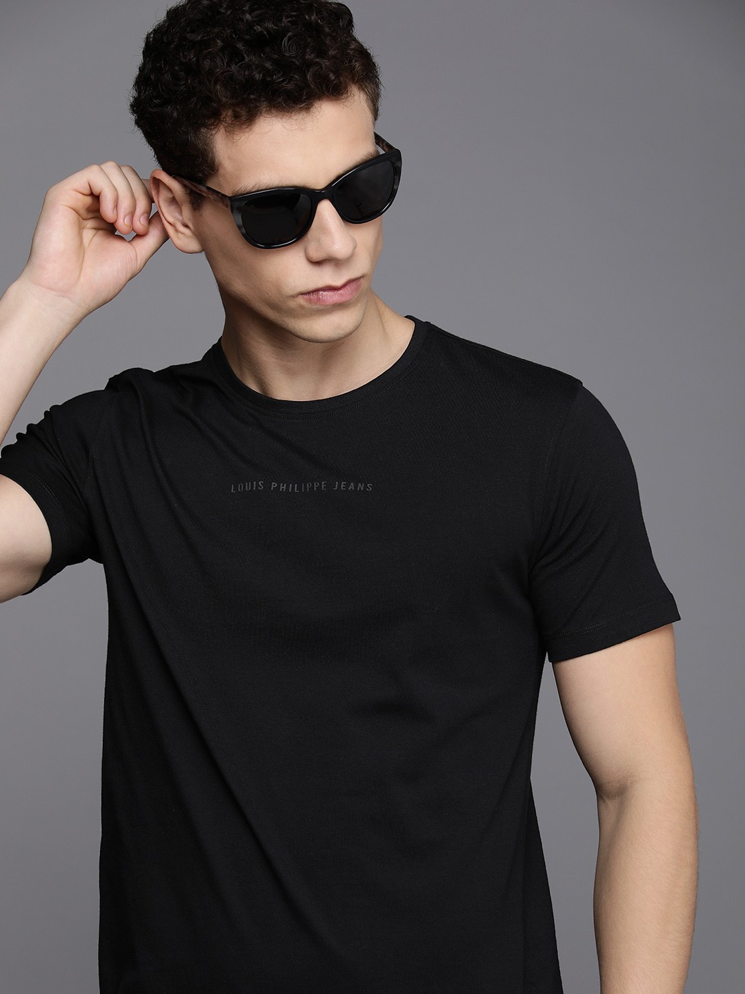 

Louis Philippe Jeans Solid Round Neck Pure Cotton Slim Fit T-shirt, Black