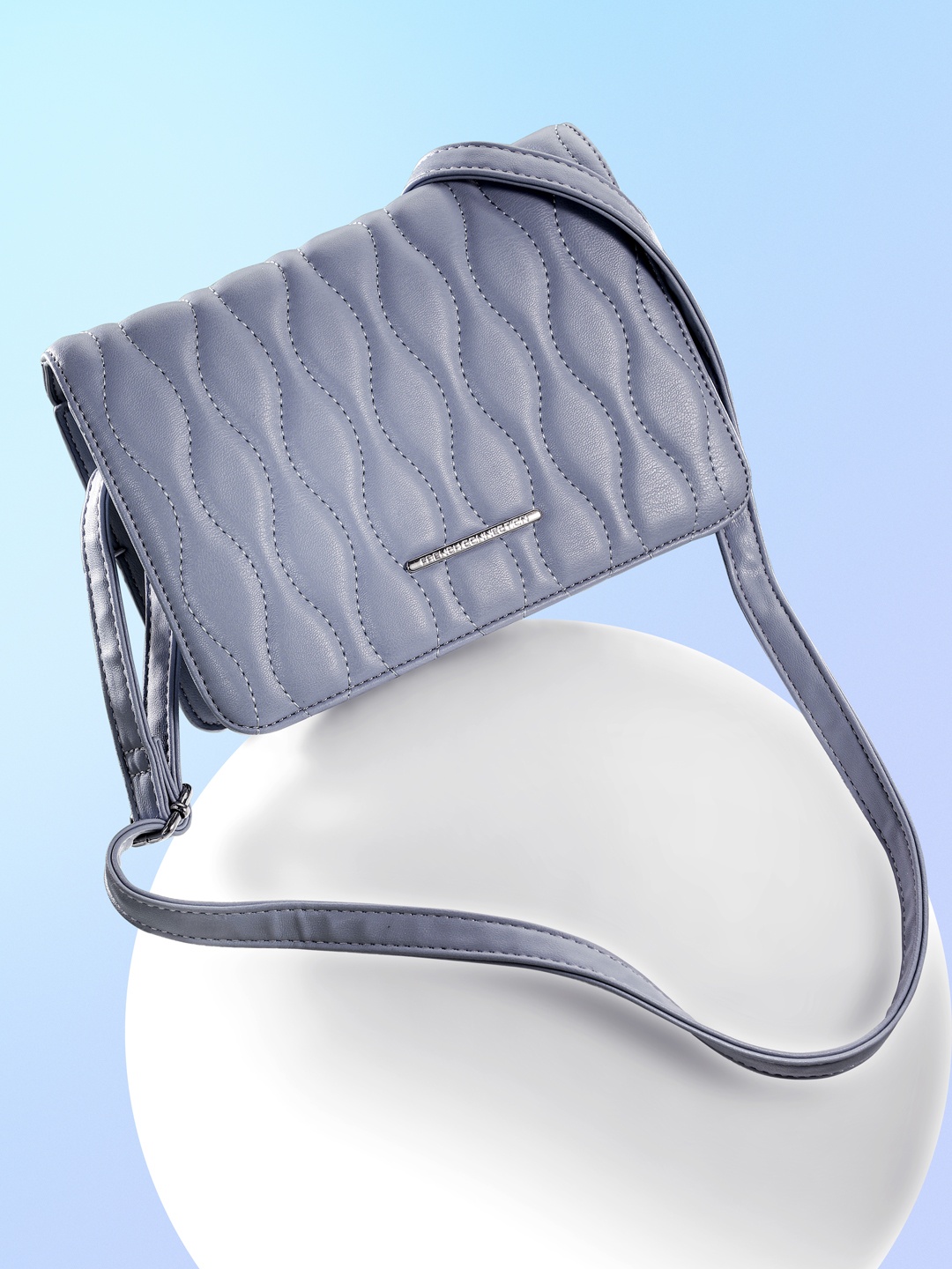 

French Connection Solid Quilted Structured Sling Bag, Blue