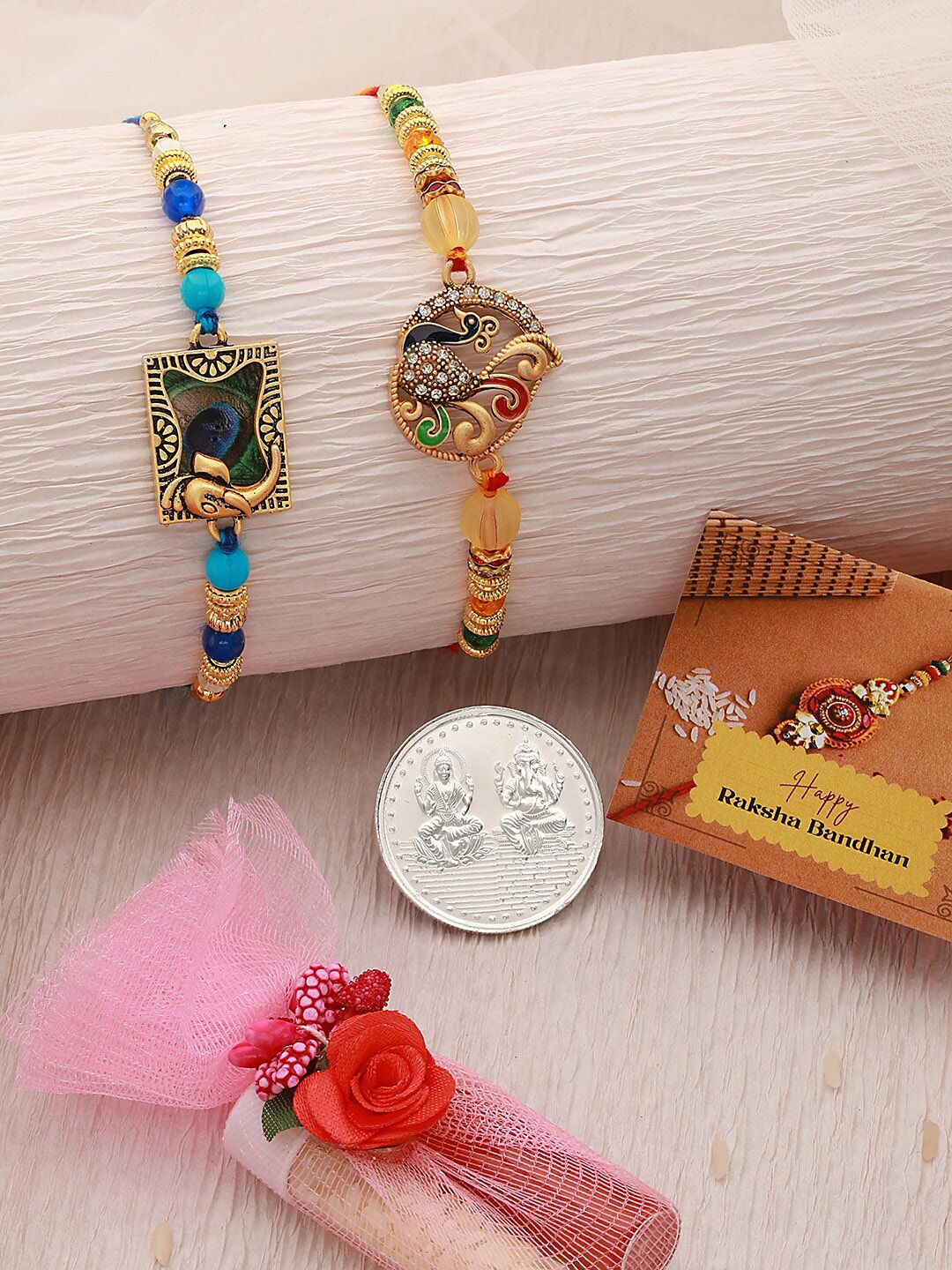

Saraf RS Jewellery Set Of 2 Rakhi With 999 Pure Silver Coin, Gold