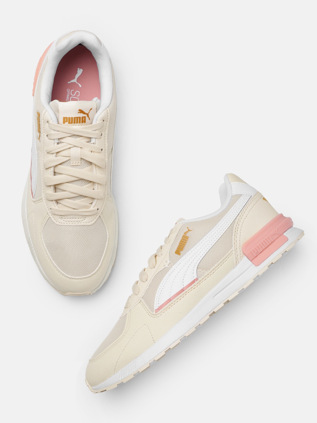

Puma Women Solid Graviton Sneakers, Cream