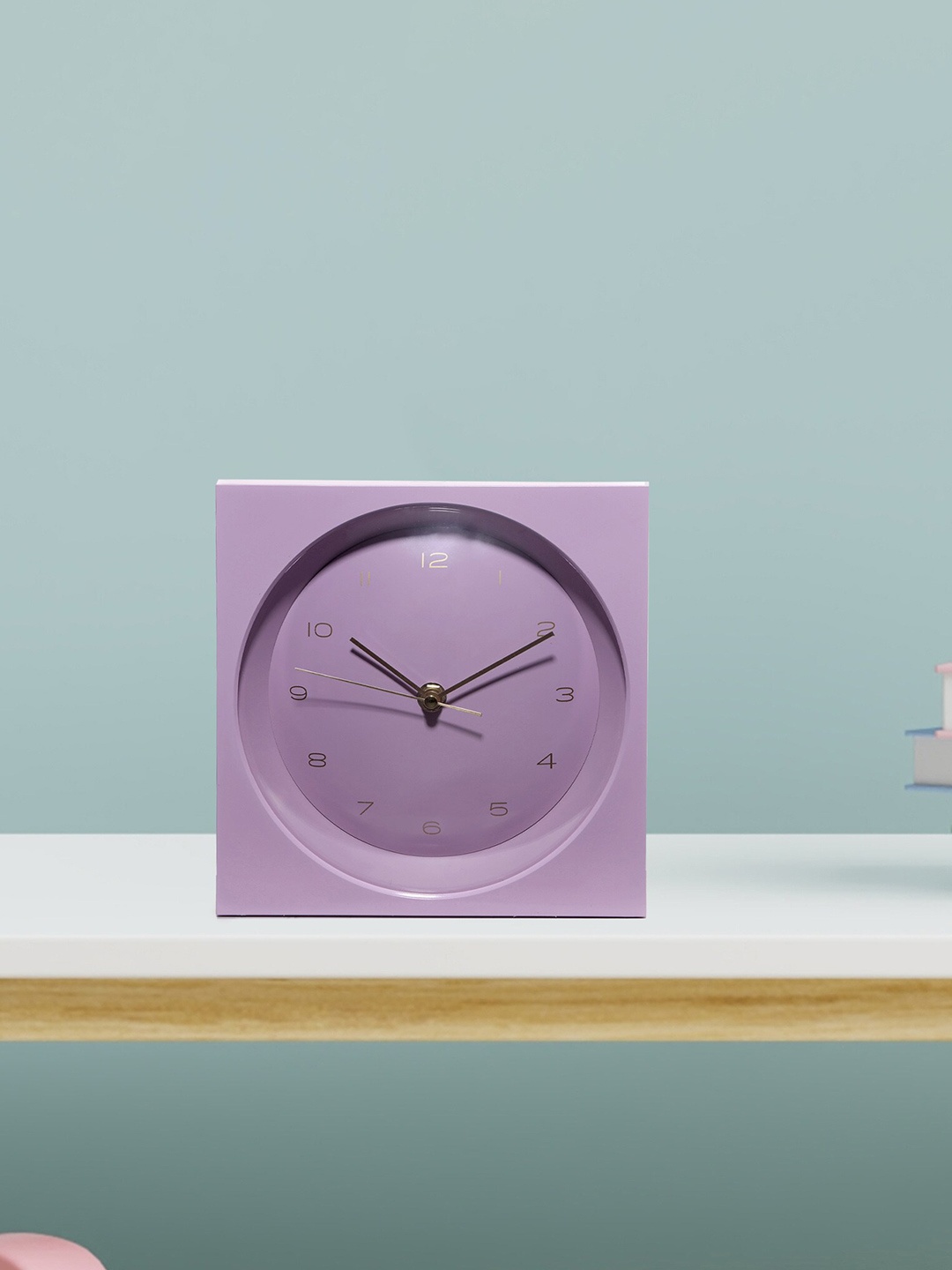 

Home Centre Pacific Ambrose Purple Analogue Contemporary Wall Clock