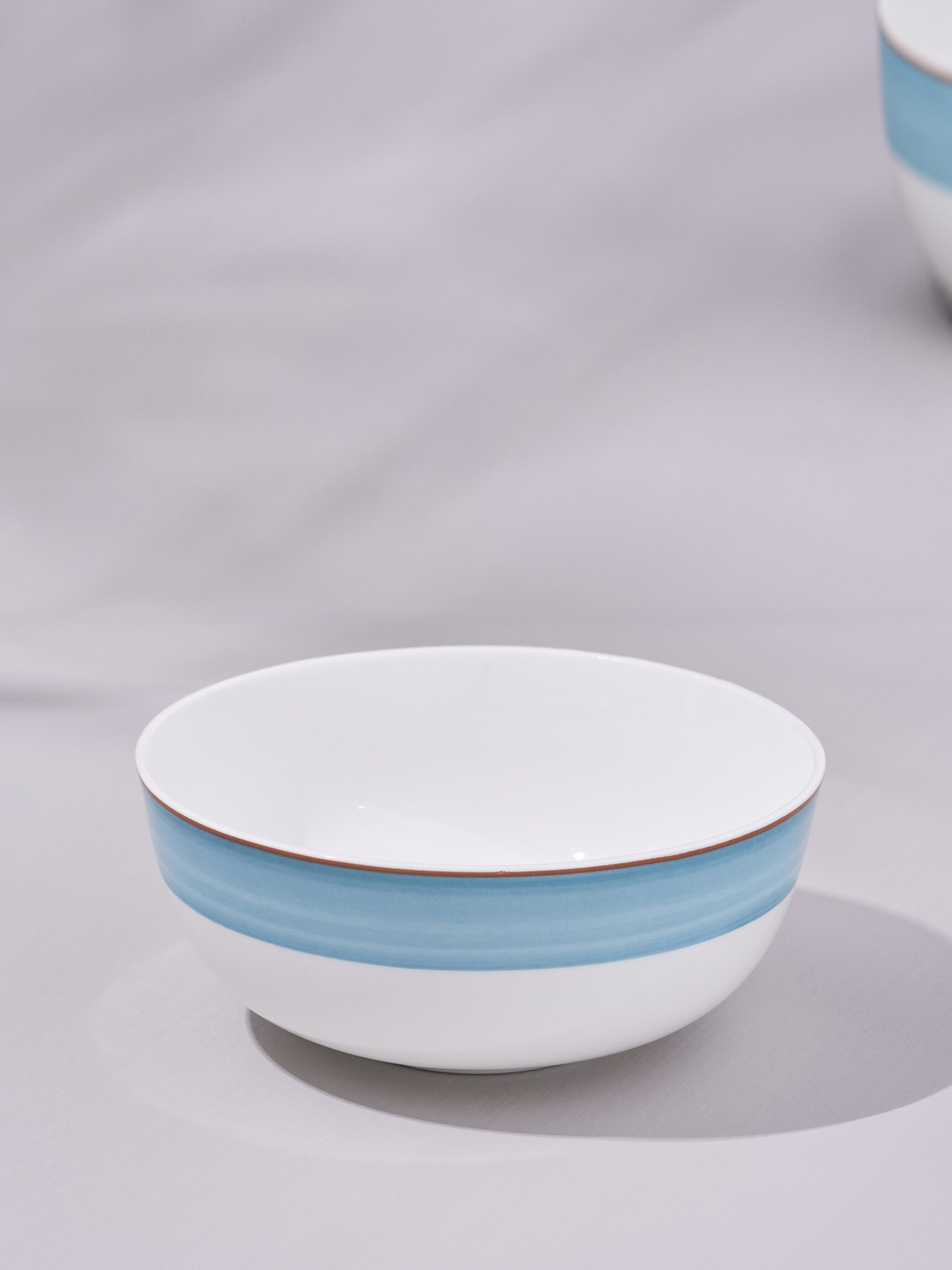 

Home Centre Colour Refresh White & Blue Colorblocked Stoneware Cereal Bowl