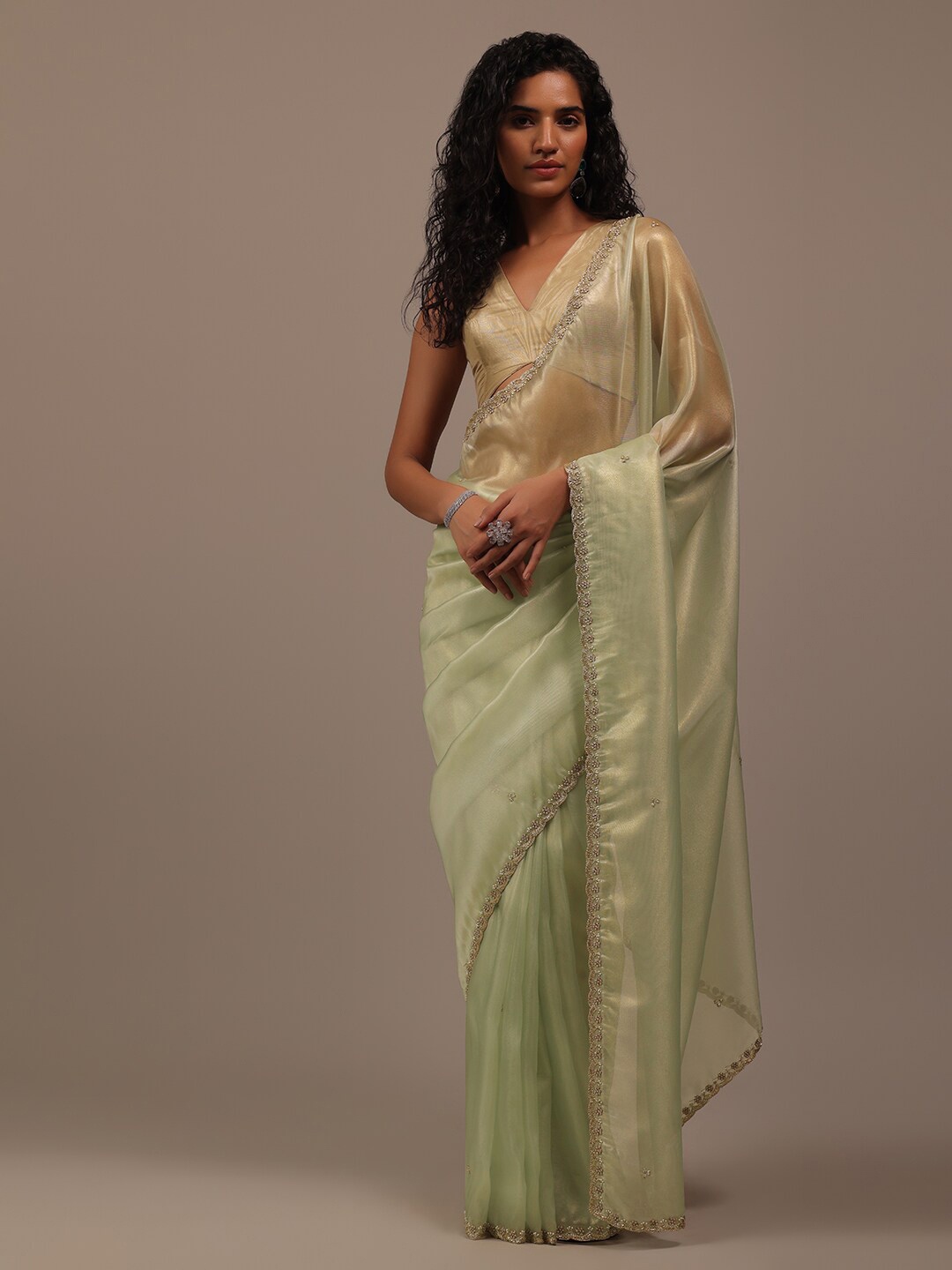 

KALKI Fashion Embellished Beads and Stones Tissue Saree, Green