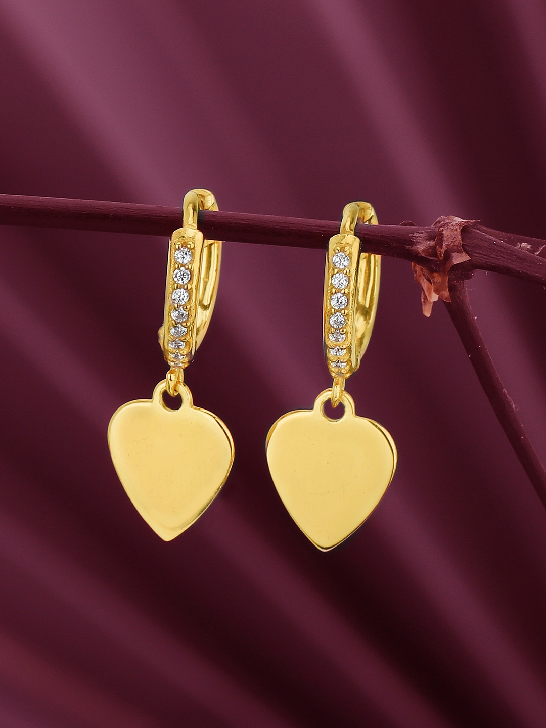 

Carlton London 18Kt Gold Plated Hoop Earrings with dangling Hearts