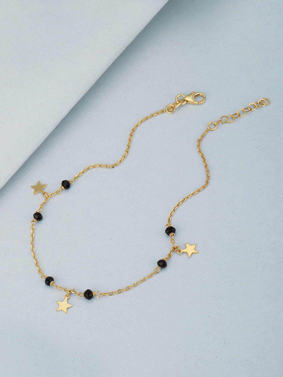

Carlton London 18Kt Gold Plated Anklet with Black Beads & dangling Stars
