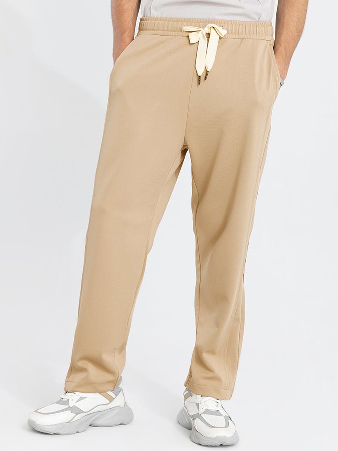 

Snitch Cream-Coloured Men Mid Rise Smart Loose Fit Cotton Trousers