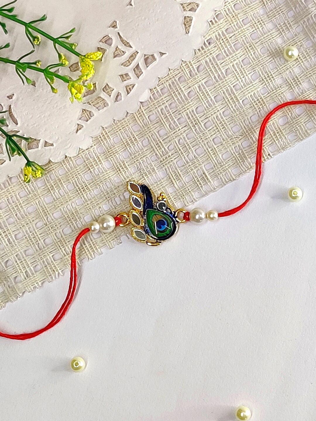 

The Magic Wand Kids Peacock Charm Thread Rakhi, Red