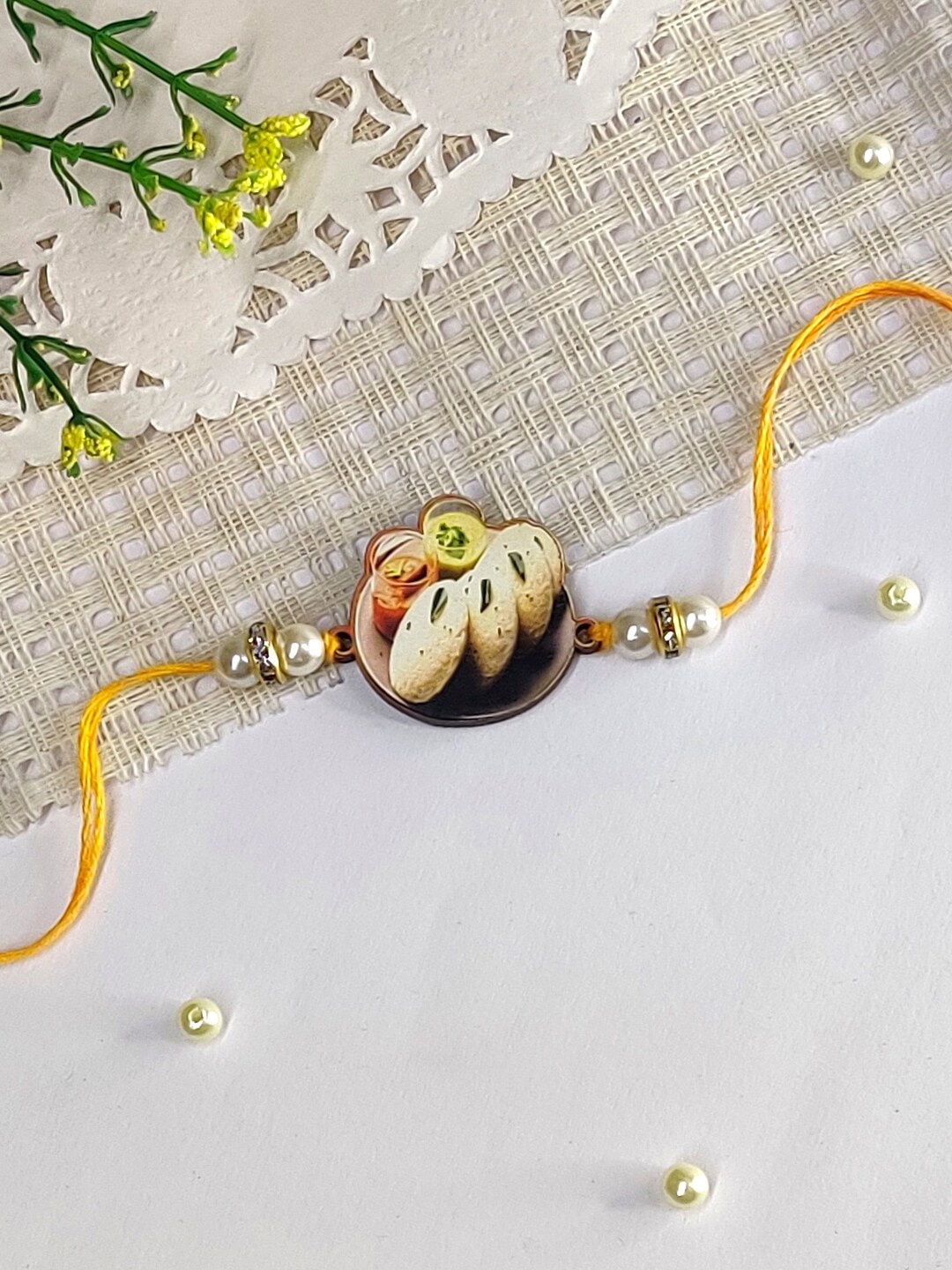 

The Magic Wand Kids Pearls Beaded Thread Rakhi, Yellow