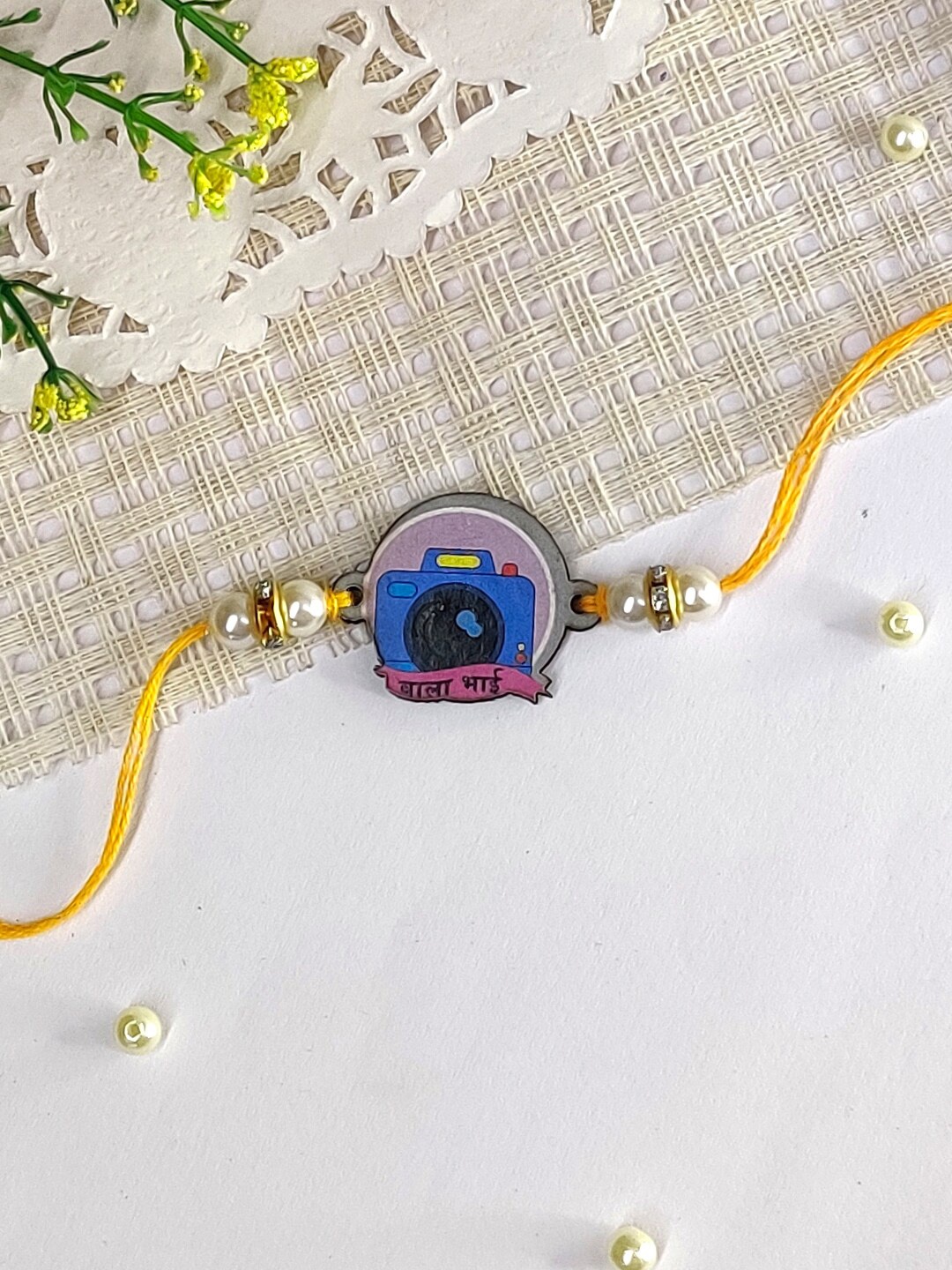 

The Magic Wand Kids Camera Charm Thread Rakhi, Yellow