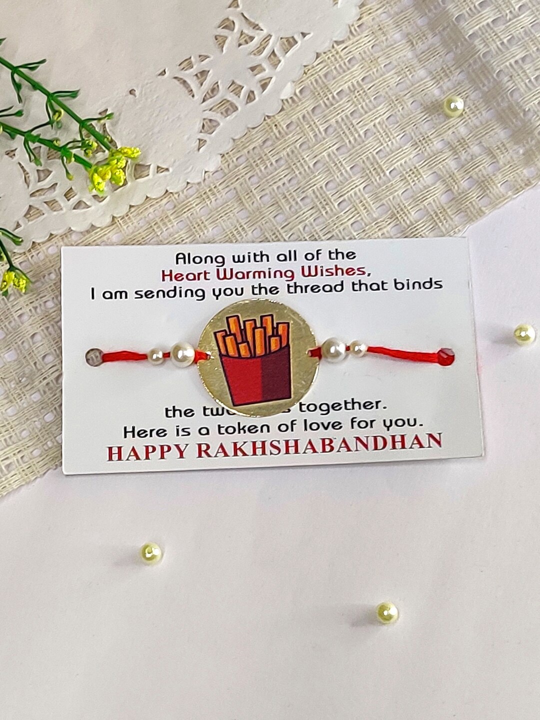 

The Magic Wand Kids Popcorn Sticker Cham Rakhi, Maroon