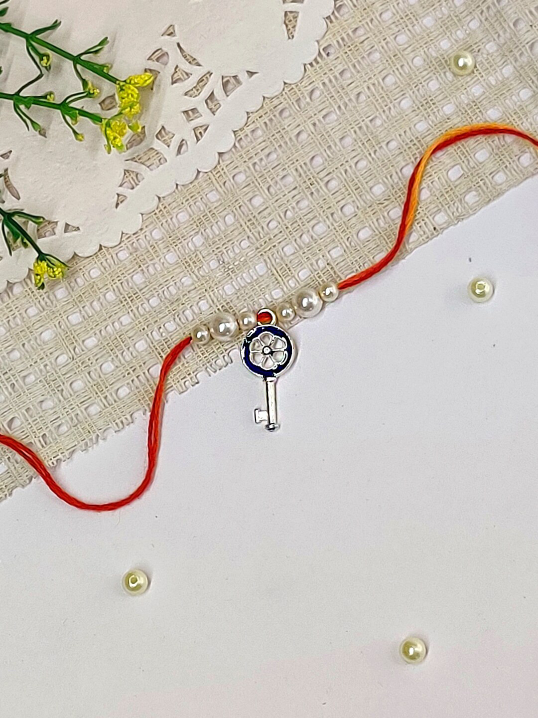 

The Magic Wand Key Charm Beaded Rakhi, Navy blue
