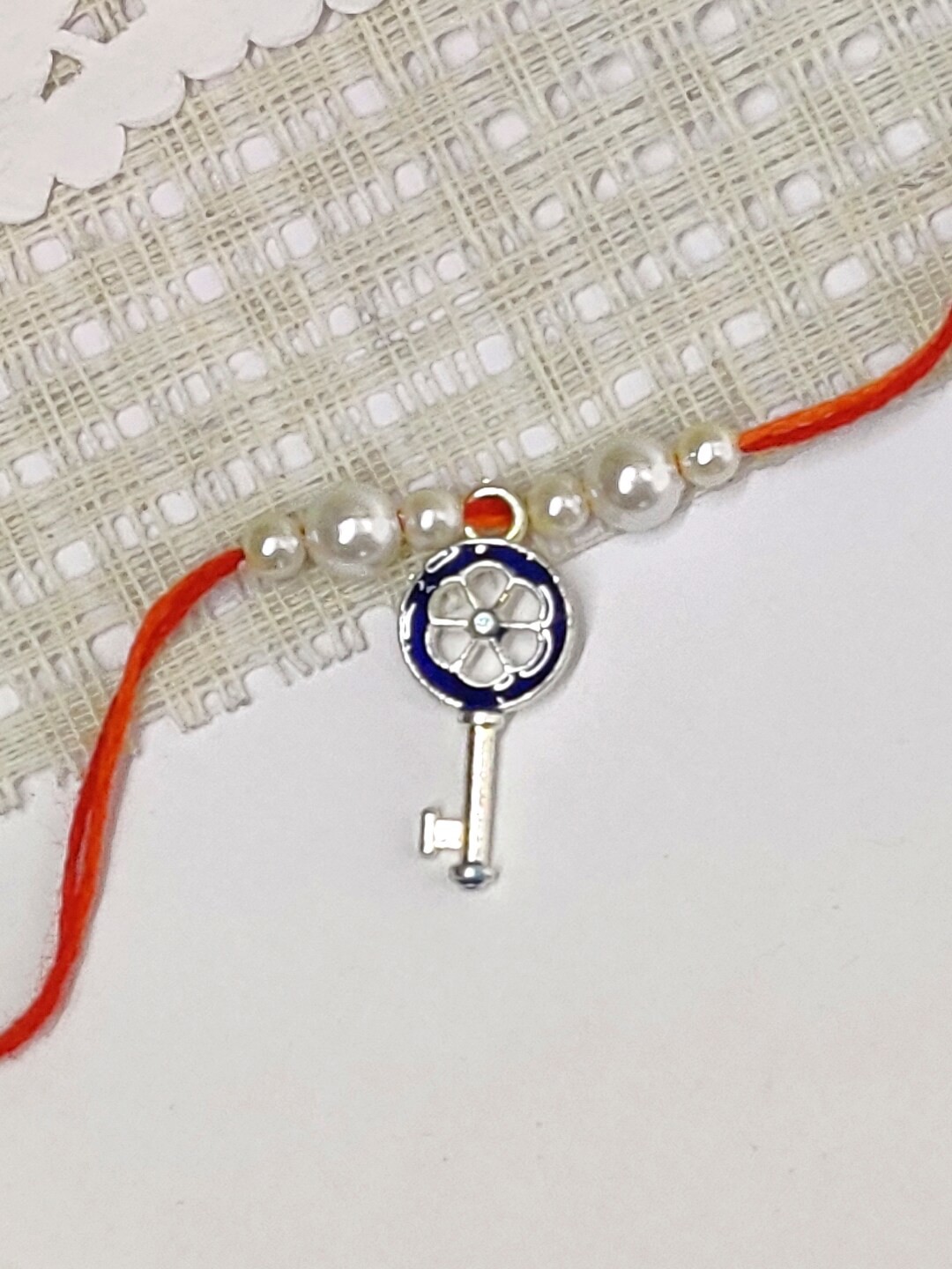 

The Magic Wand Pearl Beaded Key Charm Rakhi, Green
