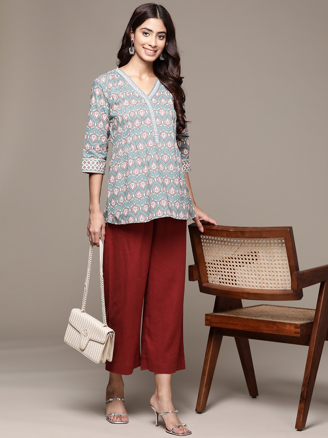 

Anubhutee Ethnic Motifs Printed V-Neck Pure Cotton Pleated Kurti, Turquoise blue