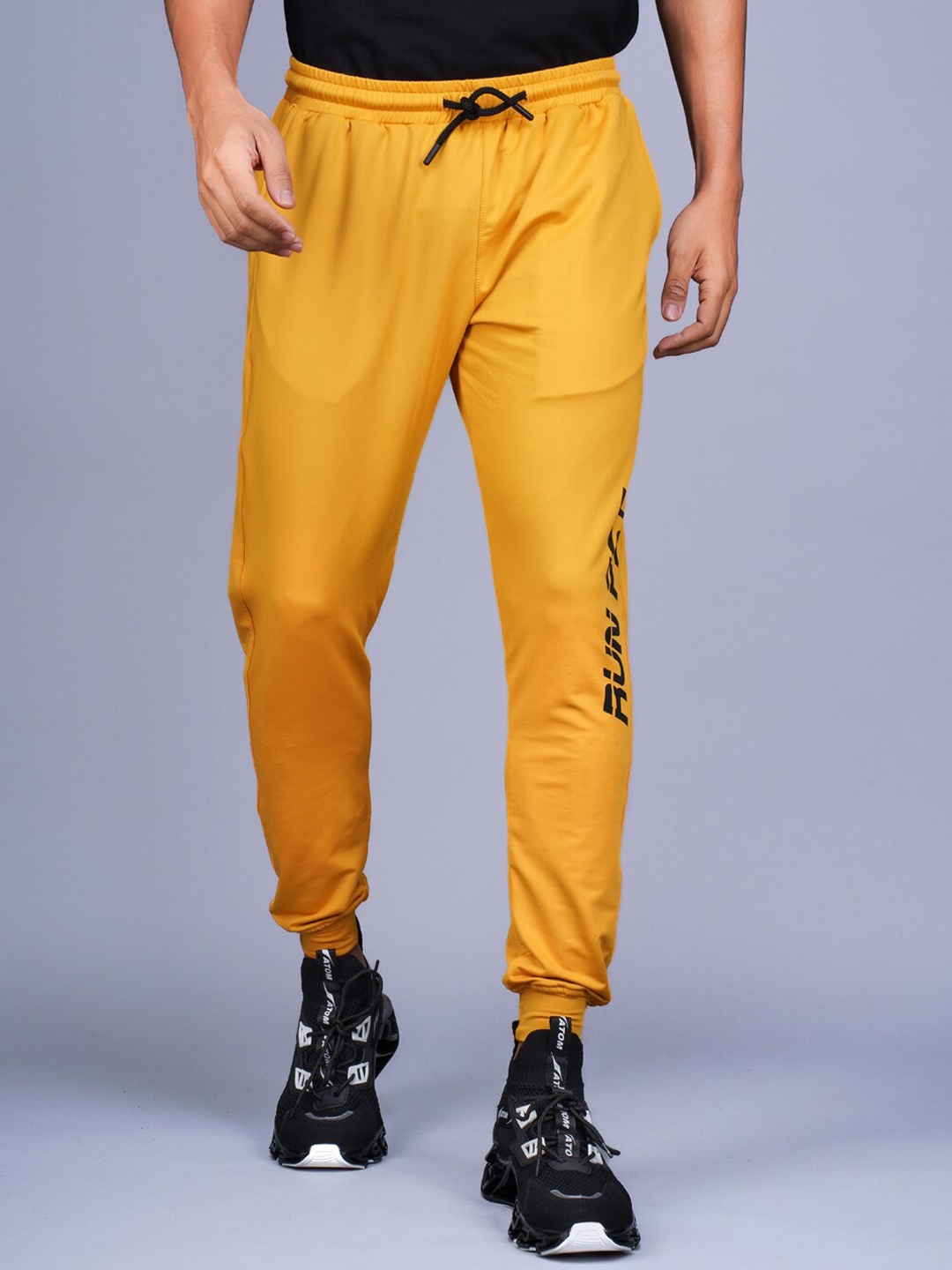 

RapidBox Men Mid-Rise Sports Pure Cotton Joggers, Yellow