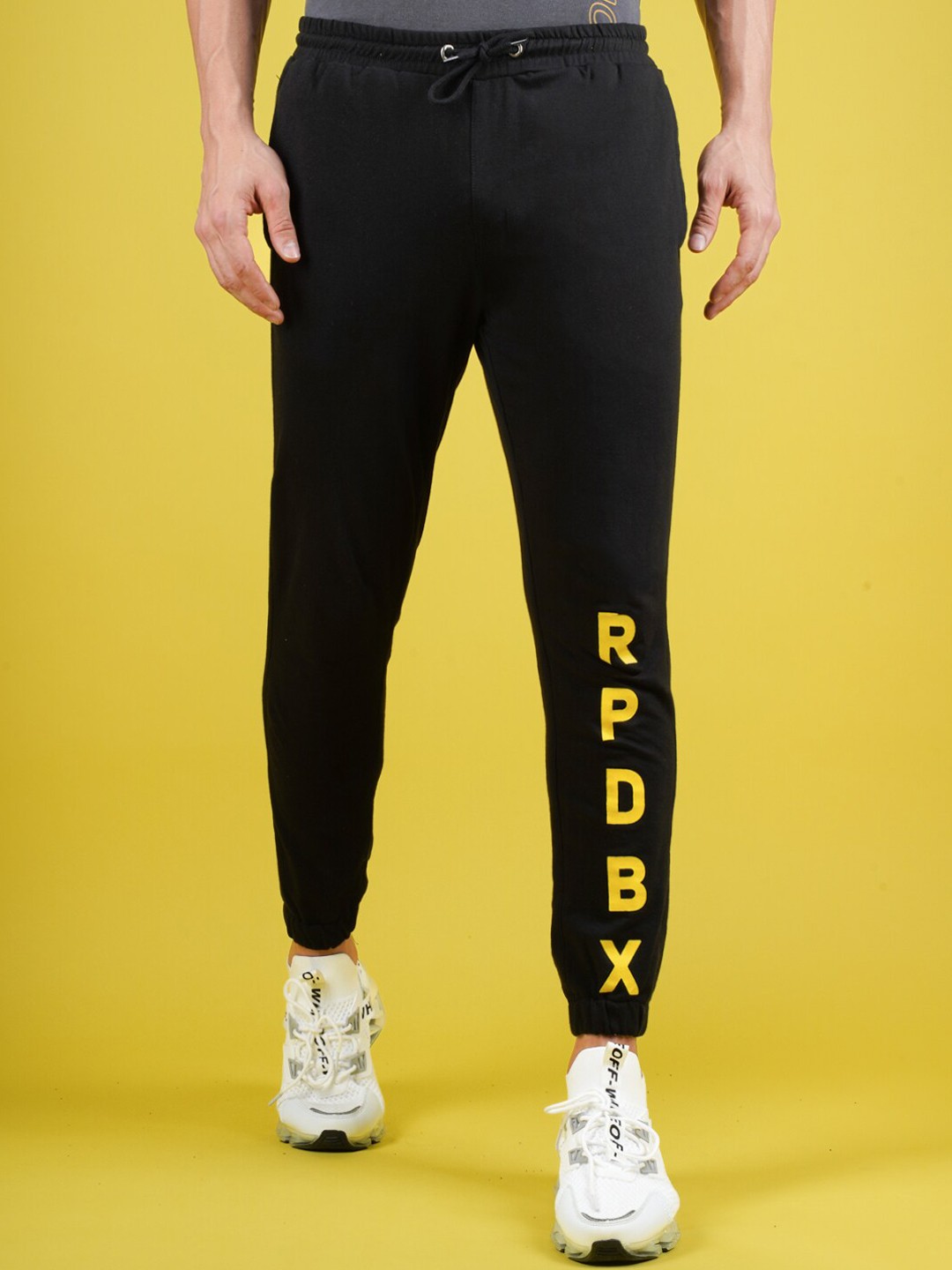 

RapidBox Men Typography Printed Mid-Rise Sports Pure Cotton Joggers, Black