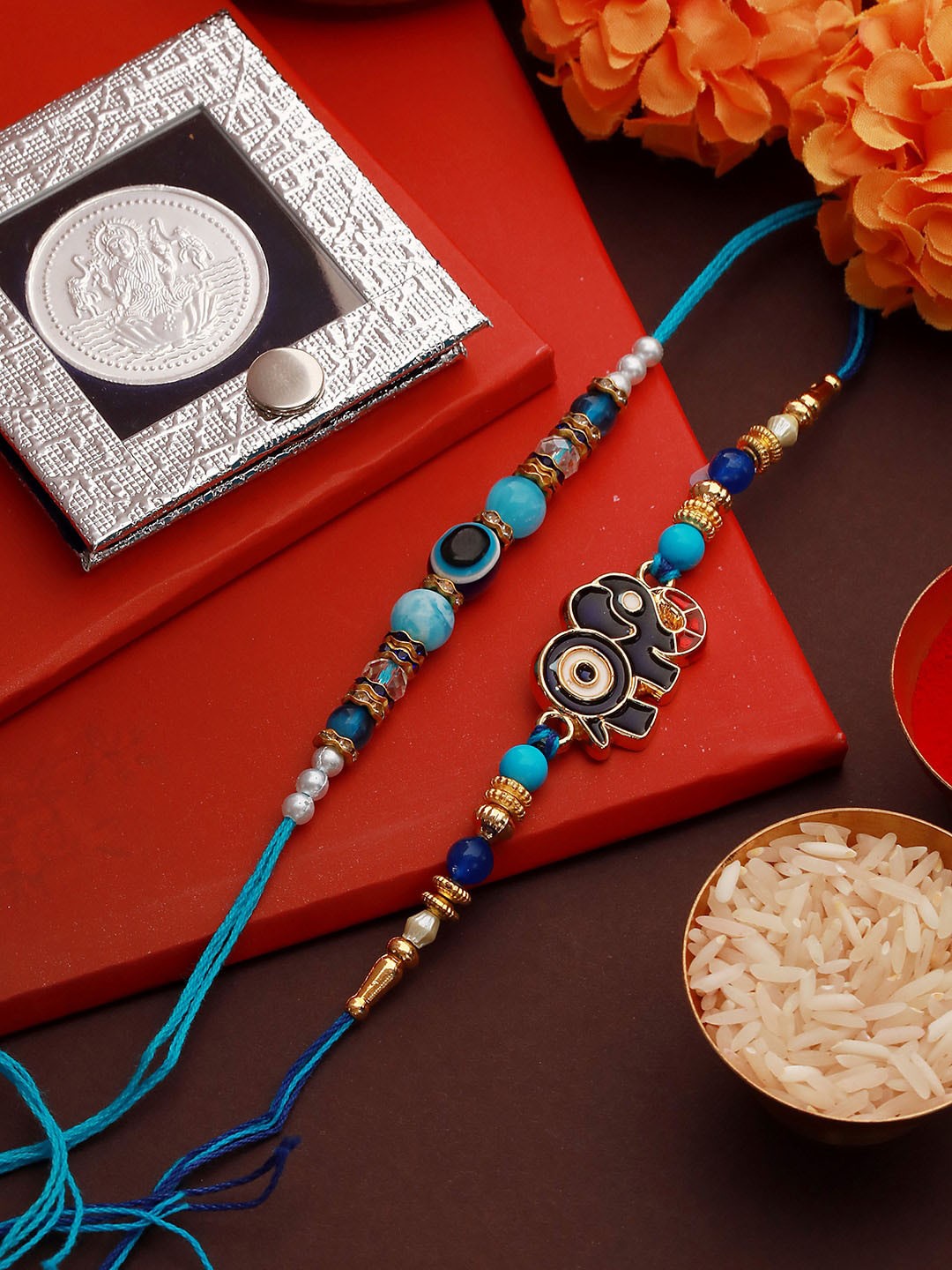 

Saraf RS Jewellery Set Of 2 Beaded Thread Rakhis With 999 Pure Silver Coin, Blue