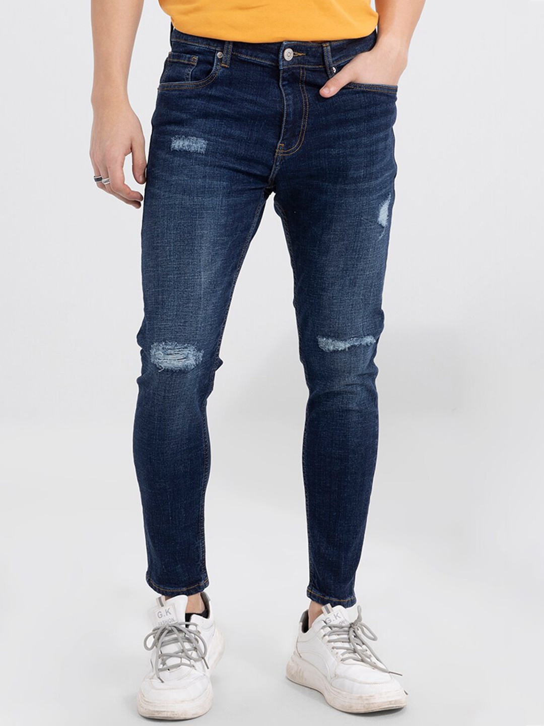 

Snitch Men Blue Skinny Fit Mildly Distressed Light Fade Stretchable Cotton Jeans