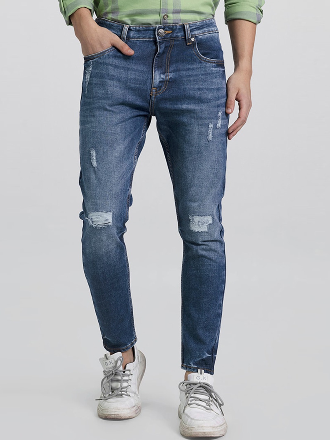 

Snitch Men Blue Skinny Fit Mildly Distressed Light Fade Stretchable Cotton Jeans