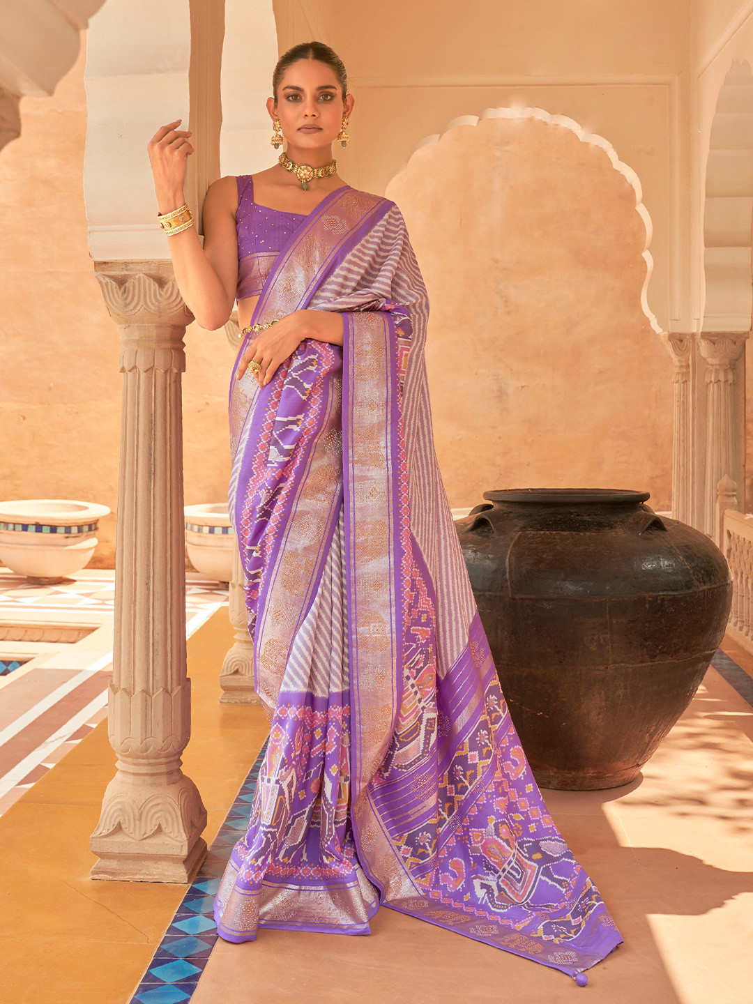 

Mitera Lavender & Gold-Toned Striped Beads And Stones Patola Saree