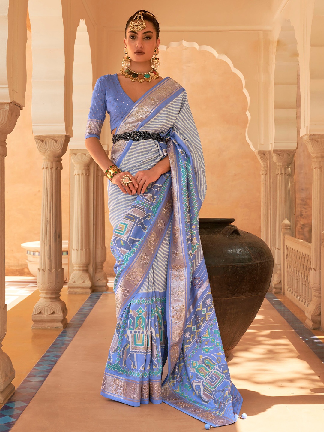 

Mitera Blue & White Striped Beads And Stones Patola Saree