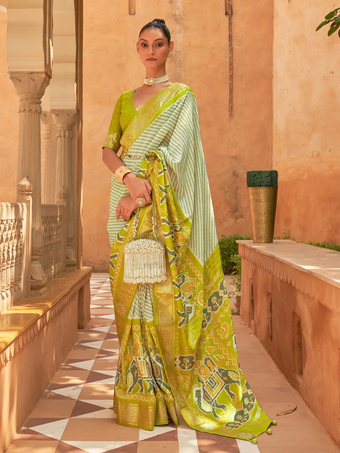 

Mitera Lime Green & White Striped Beads And Stones Patola Saree