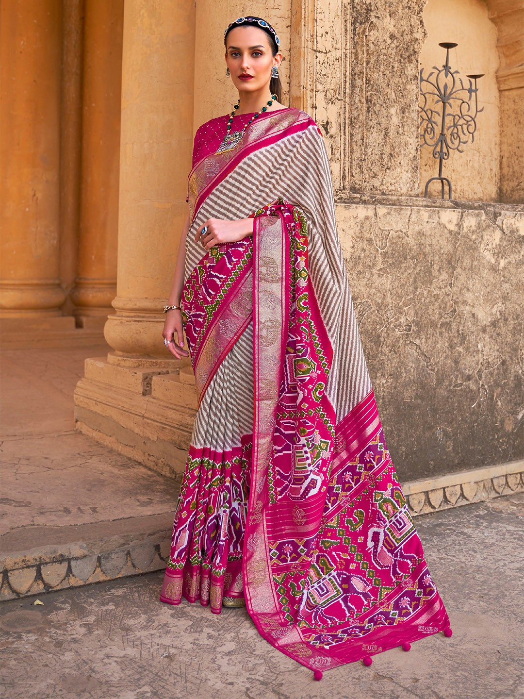 

Mitera Brown & Pink Striped Beads And Stones Patola Saree