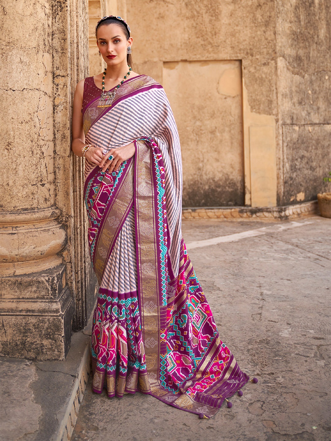 

Mitera Violet & White Striped Beads and Stones Patola Saree