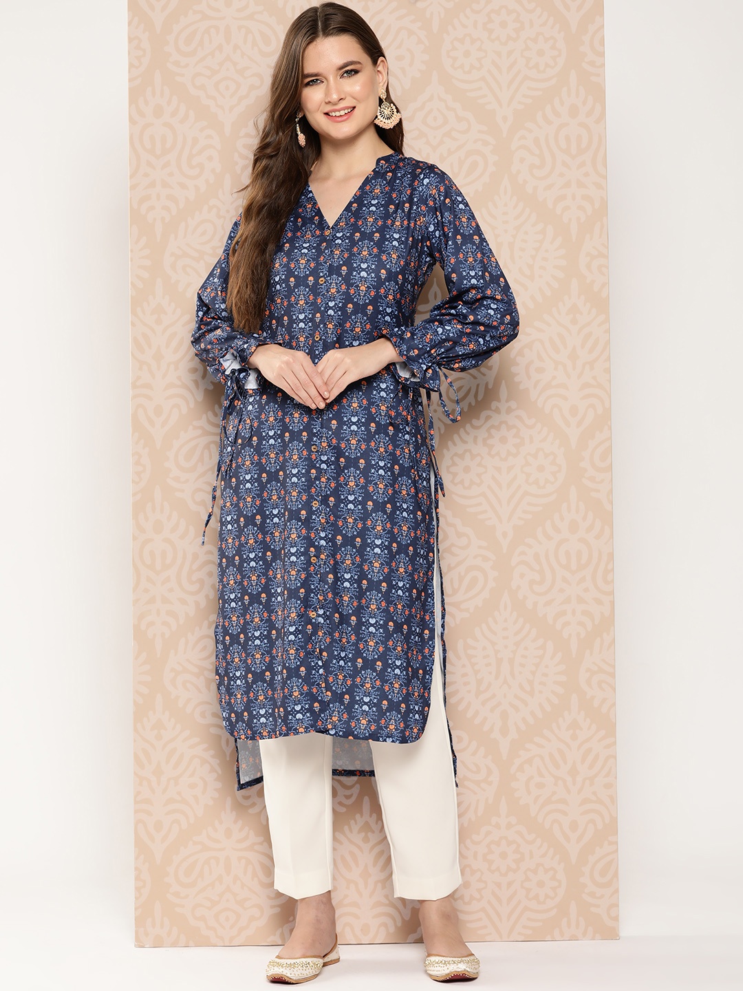 

Janasya Floral Printed Puff Sleeves Kurta, Blue