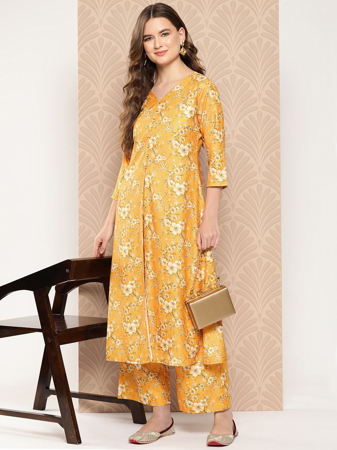 

Janasya Women Floral Printed Regular Kurta with Palazzos, Mustard