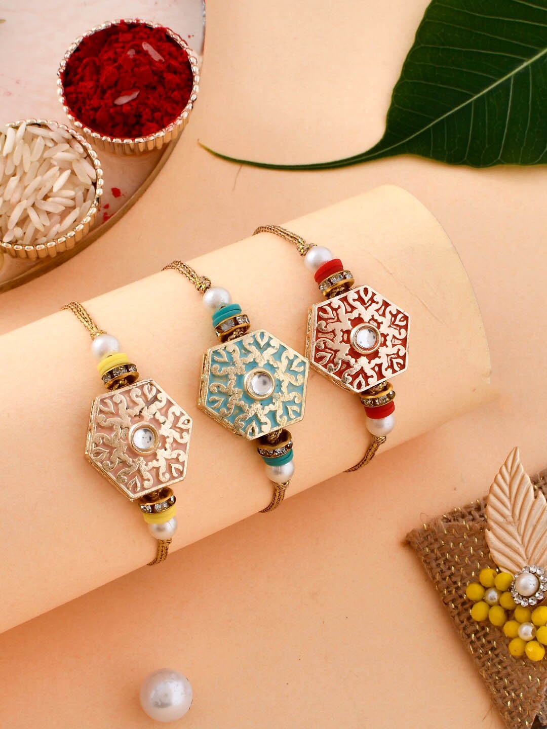 

Aapno Rajasthan Unisex Set Of 3 Metal Engraved Rakhi, Yellow