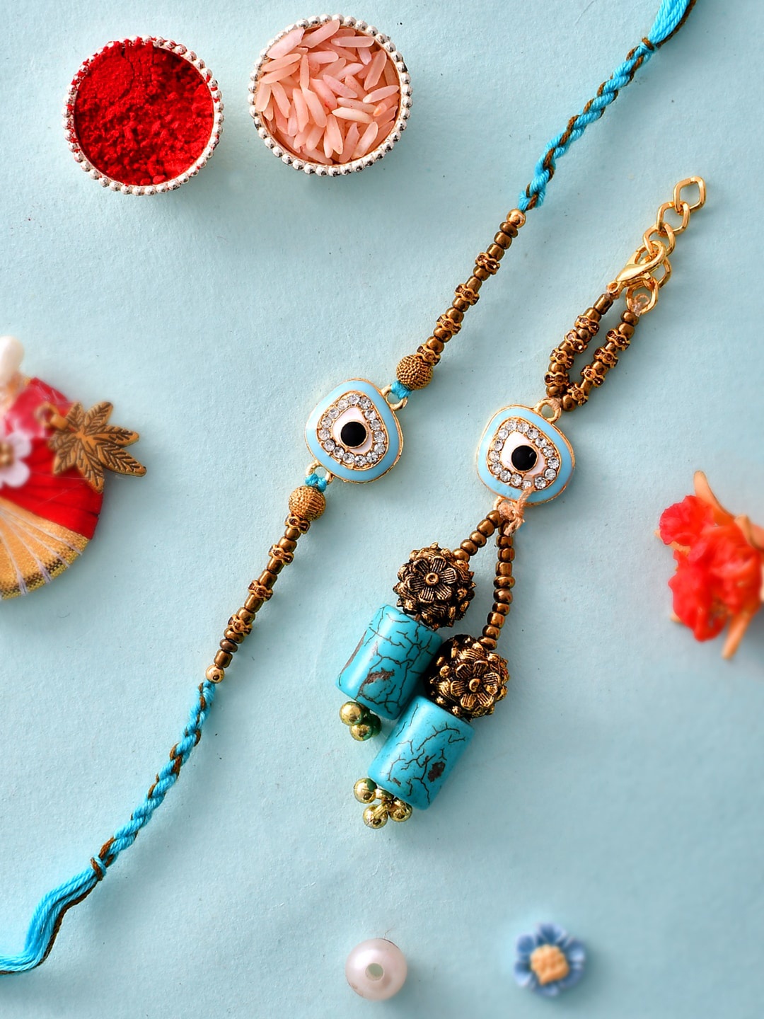 

Aapno Rajasthan Unisex Set Of 2 Evil Eye Bhaiya Bhabhi Rakhi Set, Blue