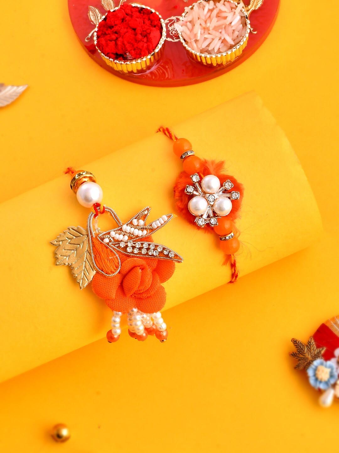 

Aapno Rajasthan Unisex Set Of 2 Vibrant Dazzling Bhaiya Bhabhi Rakhis, Orange