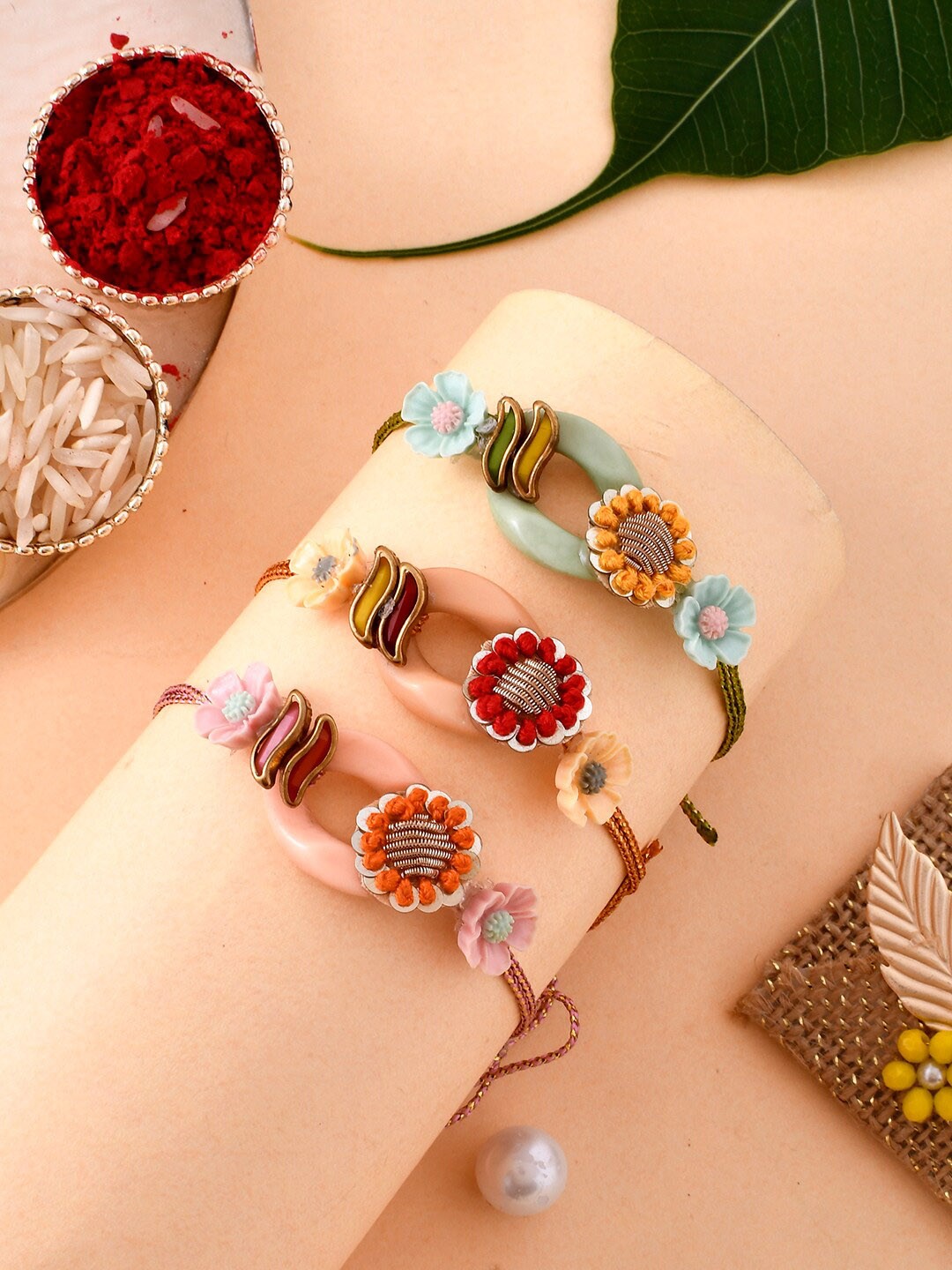 

Aapno Rajasthan Unisex Set Of 3 Multicolor Flower Rakhi, Yellow