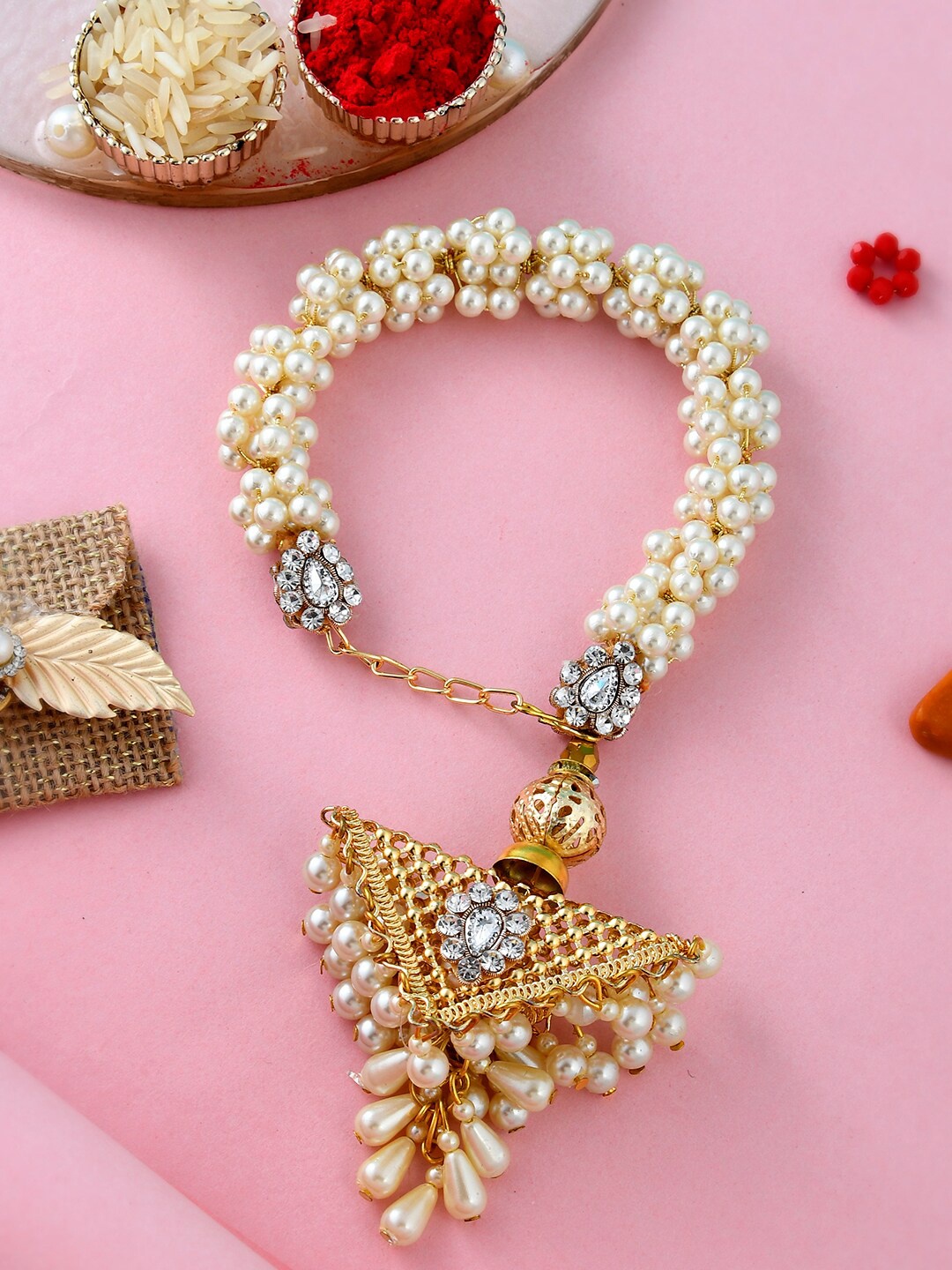 

Aapno Rajasthan Women Lumba Rakhi Comes With Roli Chawal & Greeting Card, Gold
