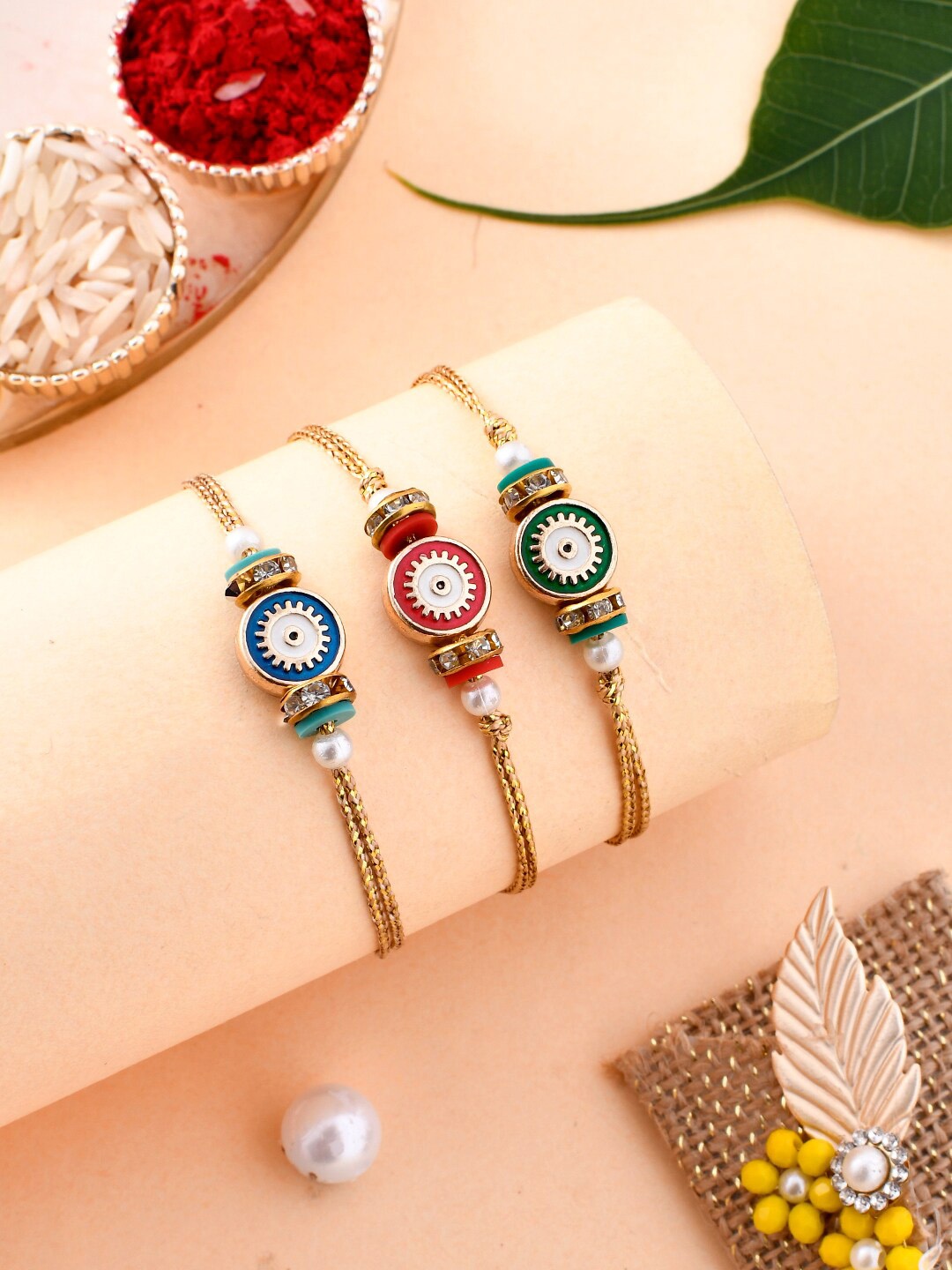 

Aapno Rajasthan Men Set Of 3 Evil Eyes Charming Rakhis, Gold