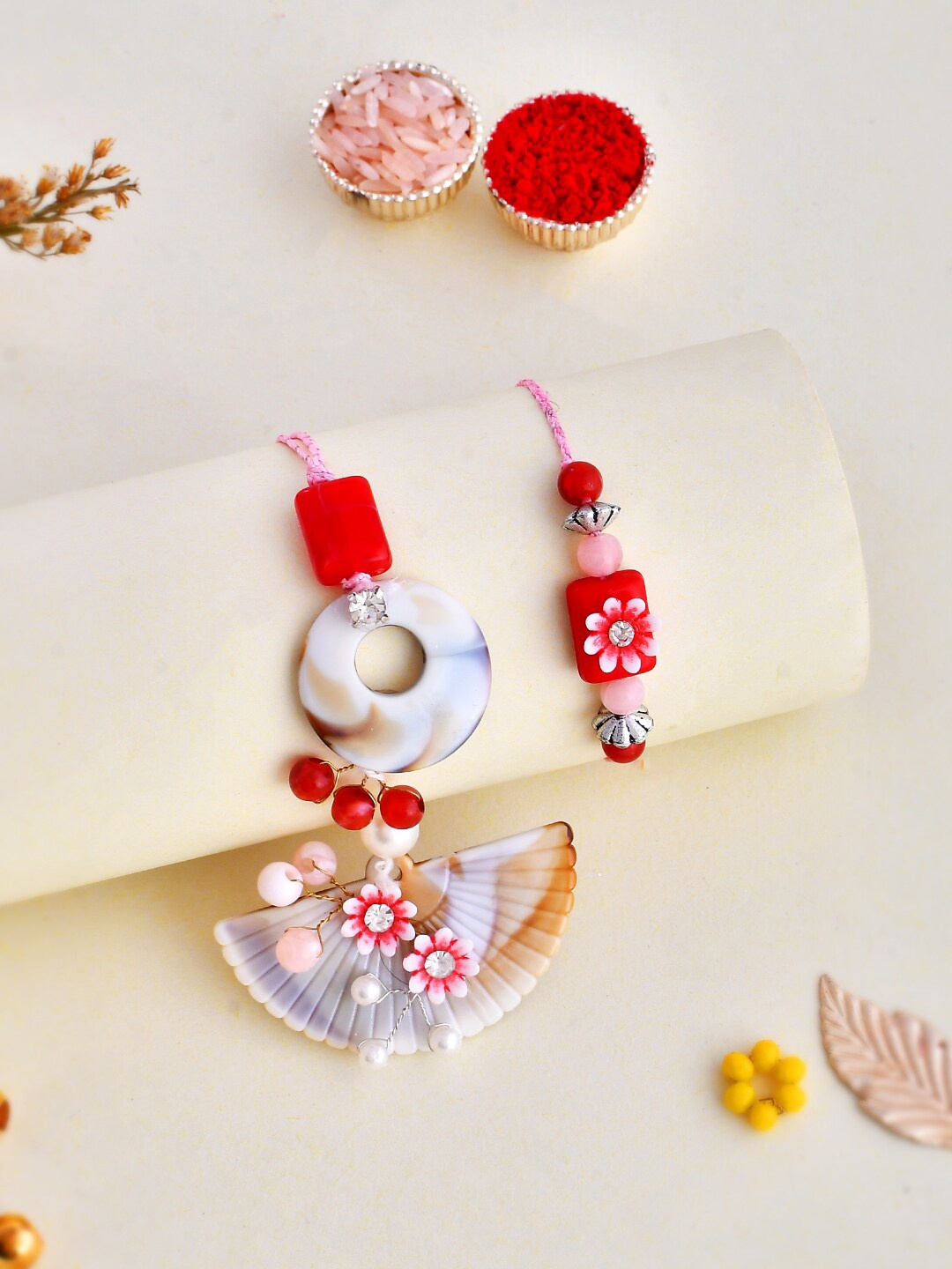 

Aapno Rajasthan Unisex Pearl & Beads Studded Resin Bhaiya Bhabhi Rakhi Set, White
