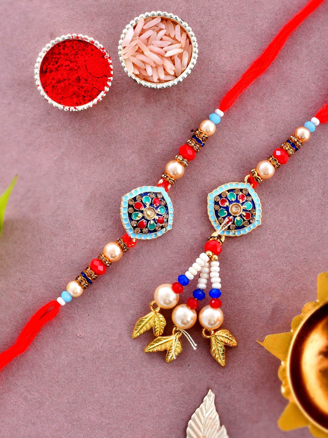 

Aapno Rajasthan Kundan Studded Bhaiya Bhabhi Rakhi., Red