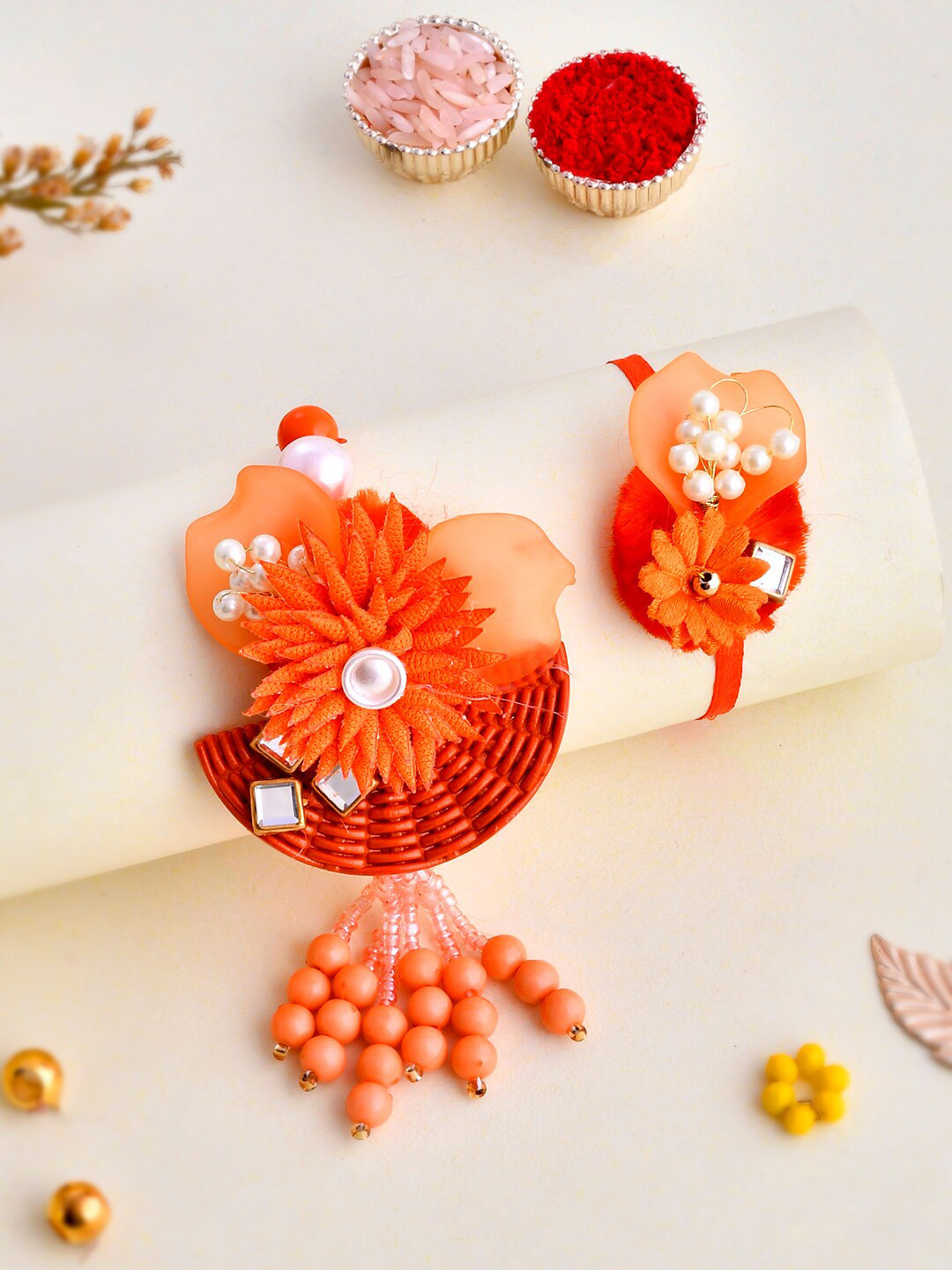 

Aapno Rajasthan Unisex Set Of 2 Pearls Beaded Thread Rakhis, Orange