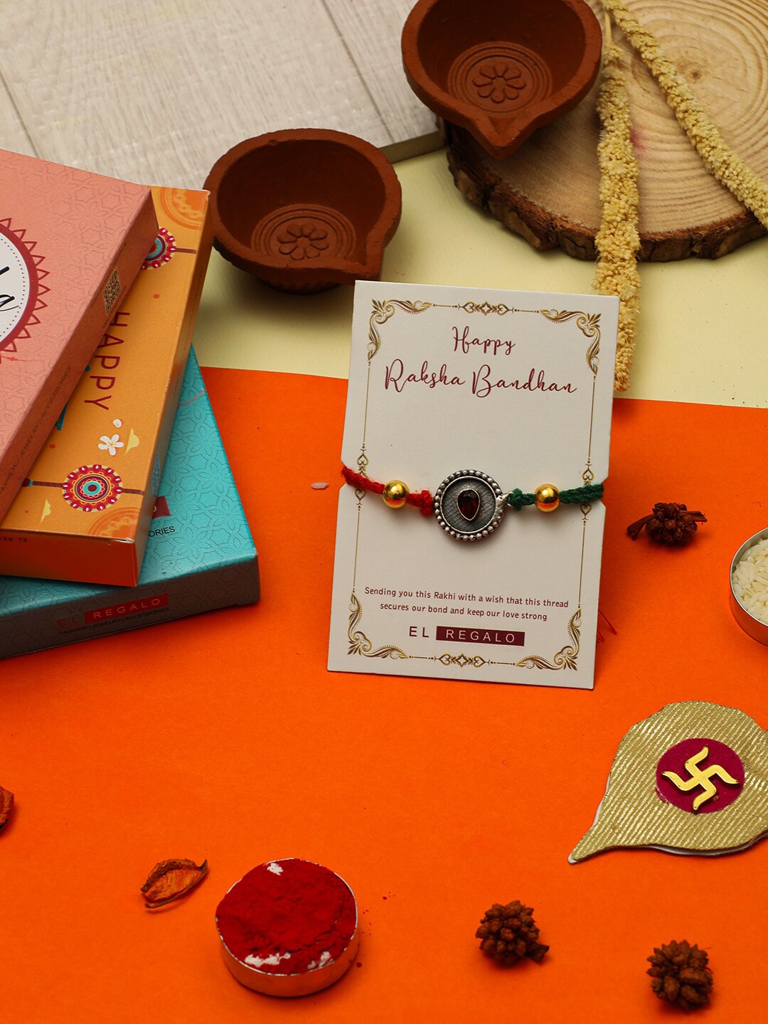 

EL REGALO Silver-Toned Embellished Thread Rakhi
