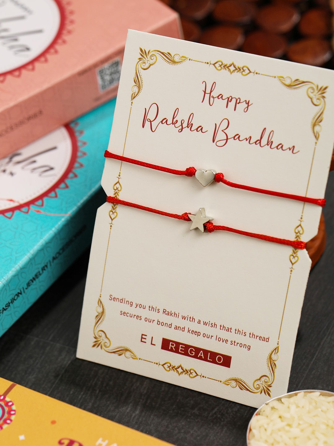

EL REGALO Kids Set Of 2 Thread Rakhis With Roli Chawal & Greeting Card, Silver