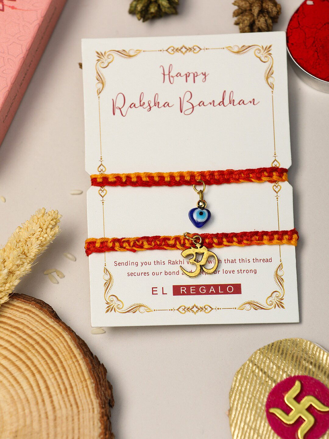 

EL REGALO Bhaiya Bhabhi Set Of 2 Om Evil Eye Thread Rakhi Combo, Gold