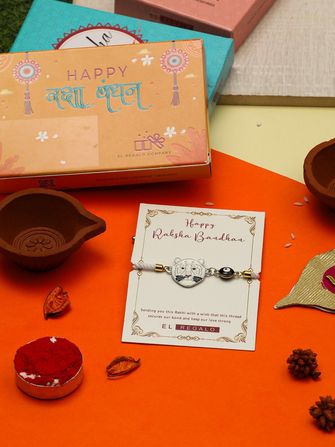 

EL REGALO Men Tiger Design Thread Rakhi With Roli Chawal & Greeting Card, White