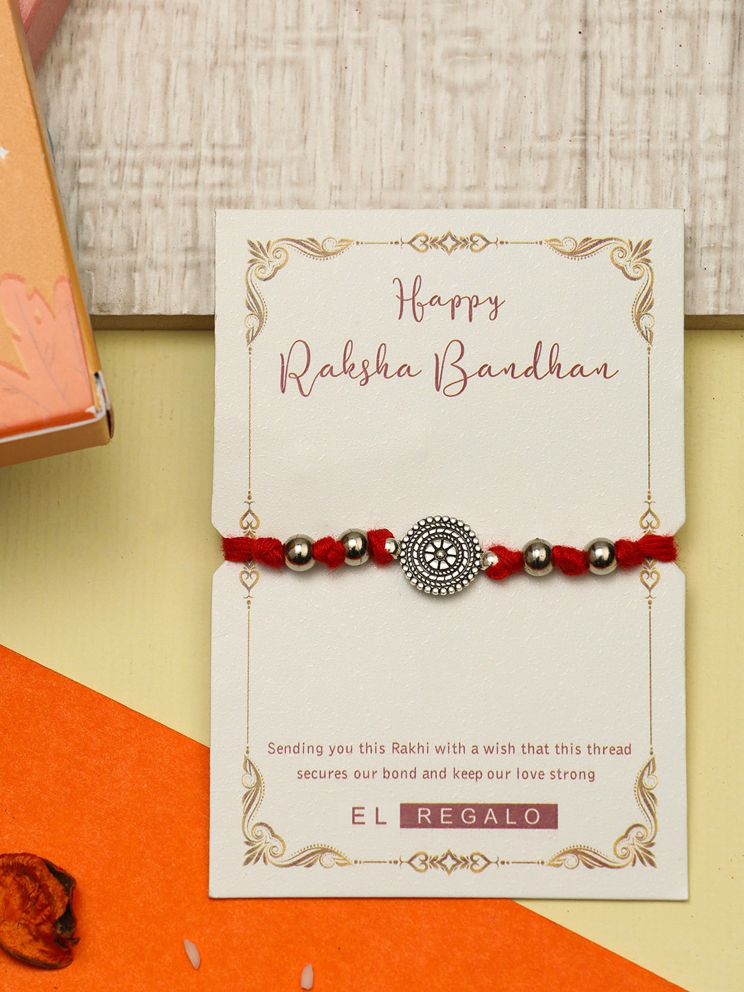 

EL REGALO Men Beaded Thread Rakhi Comes With Roli Chawal & Greeting Card, Silver