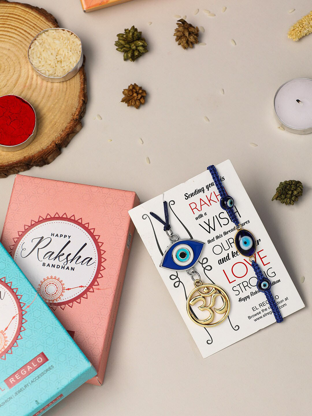 

EL REGALO Unisex Set Of 2 Om & Evil Eye Thread Bhaiya Bhabhi Rakhi, Blue