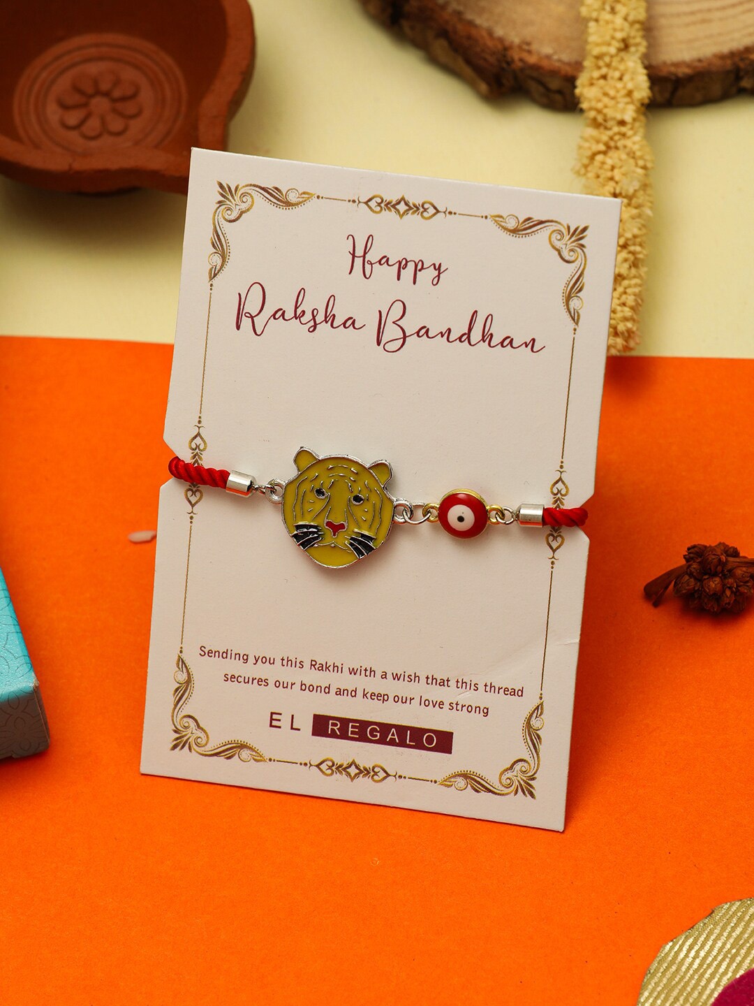 

EL REGALO Boys Tiger Design Thread Rakhi's With Roli Chawl & Card Set, Yellow