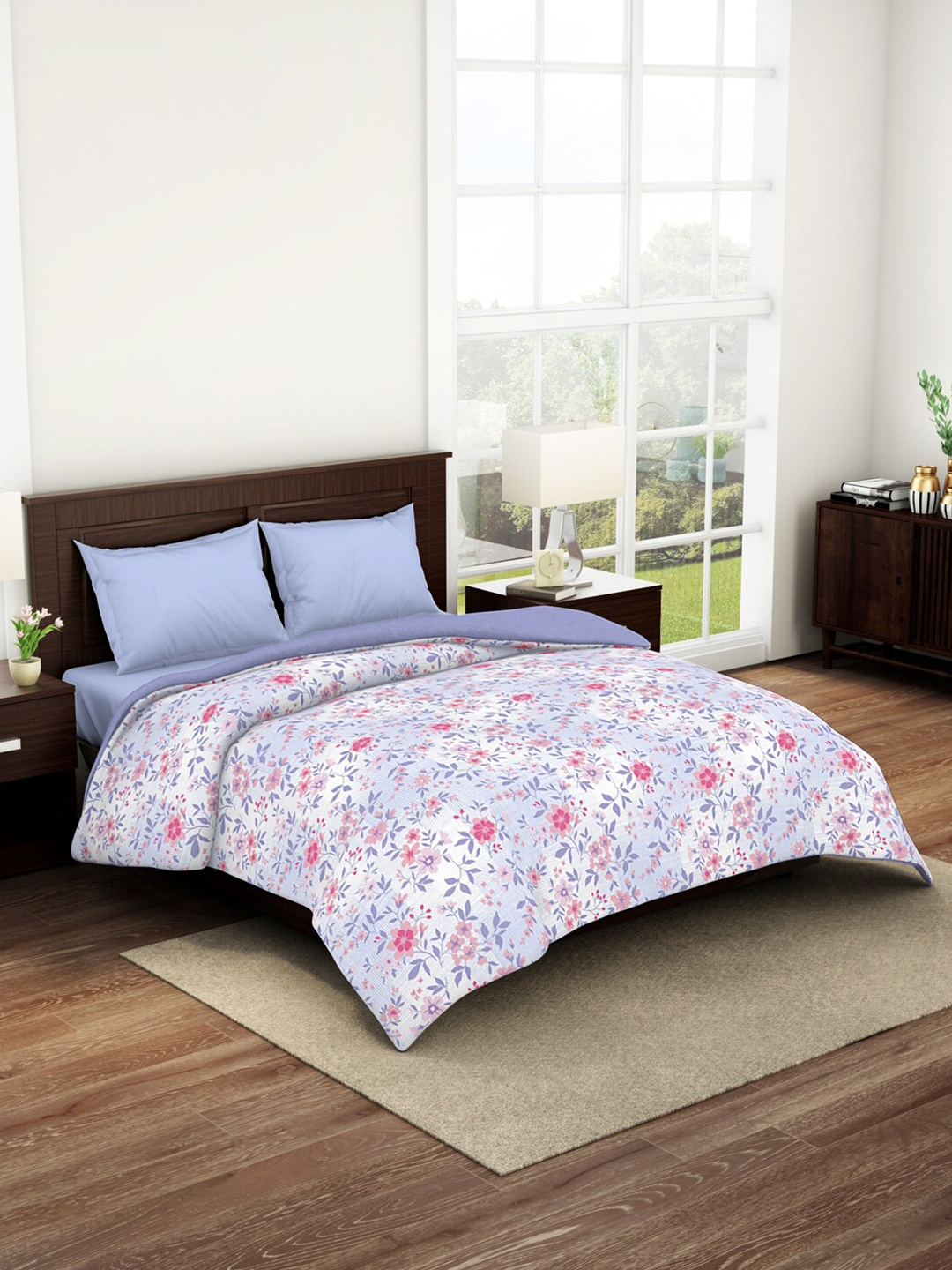 

Welspun Purple & White Floral Cotton AC Room Double Bed Quilt